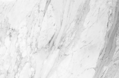 High-resolution white marble texture with natural patterns, perfect for backgrounds.